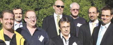 Some of the conference presenters take a moment for the camera, (l to r), Doron Kowensky, Andrew West, Tony Lange, Robert Wright, (front), Arthur Bosman, Greg Chantler, Peter Diamandis and Gary Friend.